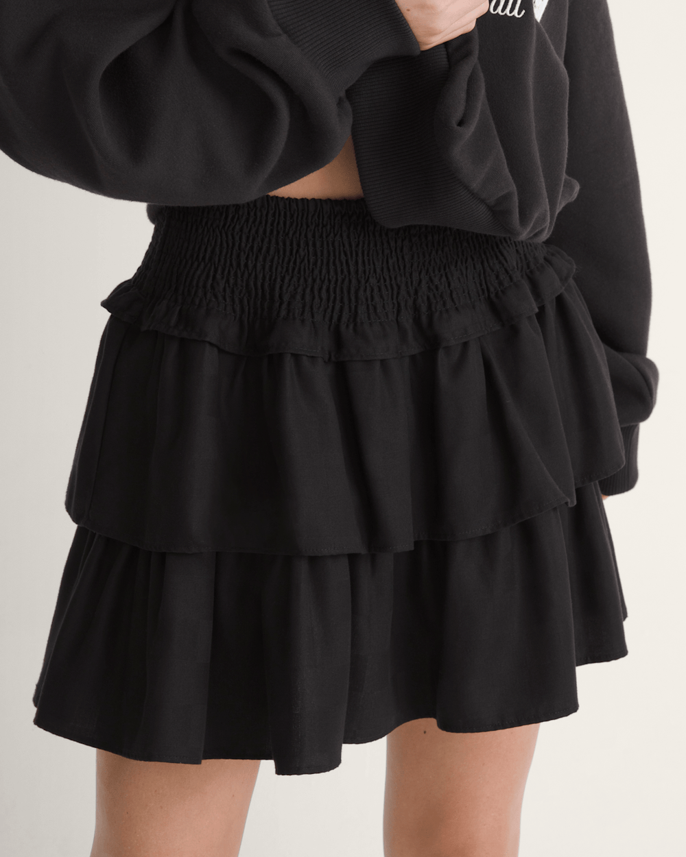 Ava Tiered Mini Skirt in Black | Vans discount